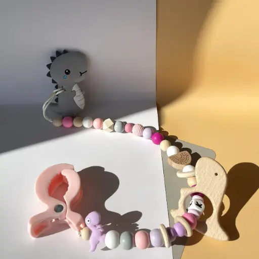 Niedlicher T-Rex - Kinderwagen-Beisskette